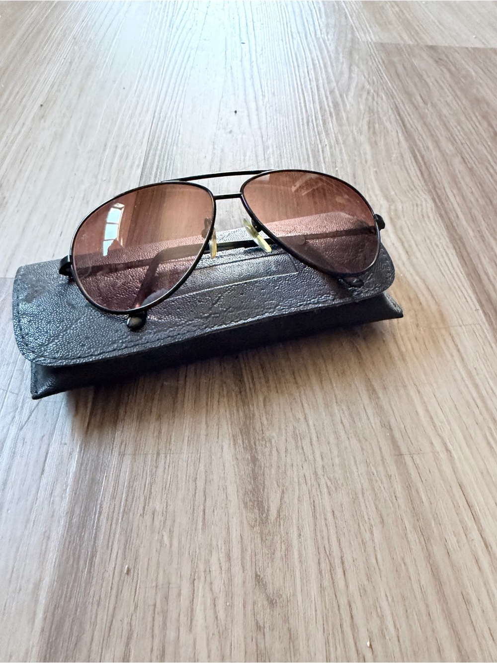 Vintage Serengeti Aviator Sunglasses with Brown Lenses and Black Frame